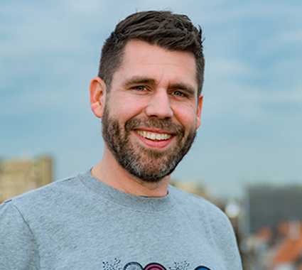 Foto van docent-onderzoeker lectoraat Empowerment & Professionalisering Huub Purmer